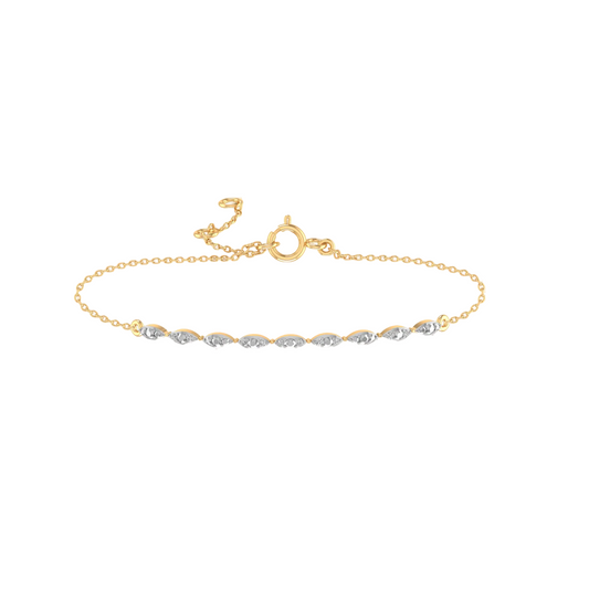 A delicate gold chain bracelet featuring a row of marquise-cut gemstones alternating between yellow gold and silver-toned settings, displayed on a clean white background.