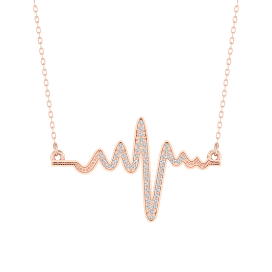 A rose gold necklace featuring an EKG heartbeat line pendant paved with small clear stones, shown against a solid white background.