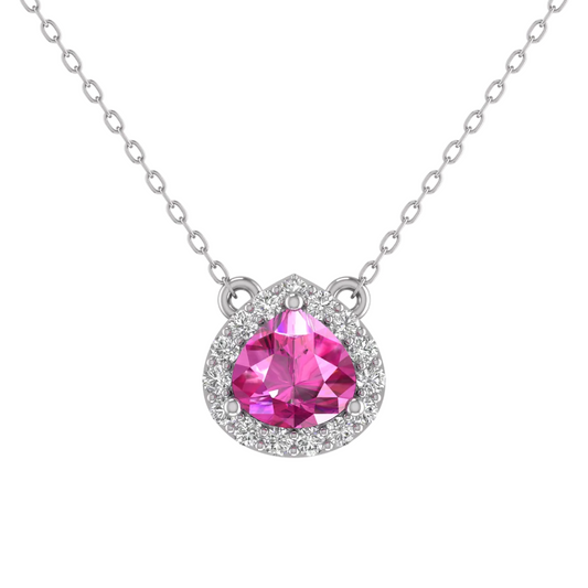 A silver-tone pendant necklace featuring a teardrop-shaped pink gemstone surrounded by a halo of small clear stones, suspended from a delicate silver chain on a white background.
